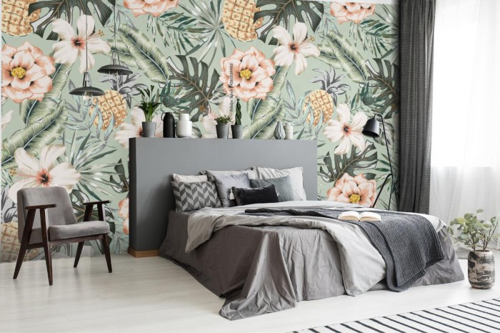 fototapeta ananasy i bale kwiaty na mietowym tle