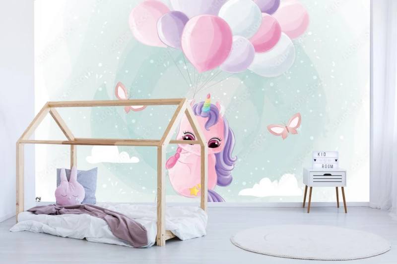 fototapeta slodki jednorozec lecacy z balonami