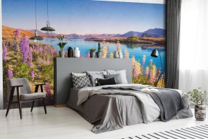 fototapeta krajobrazowy widok na jezioro tekapo i kwiaty w