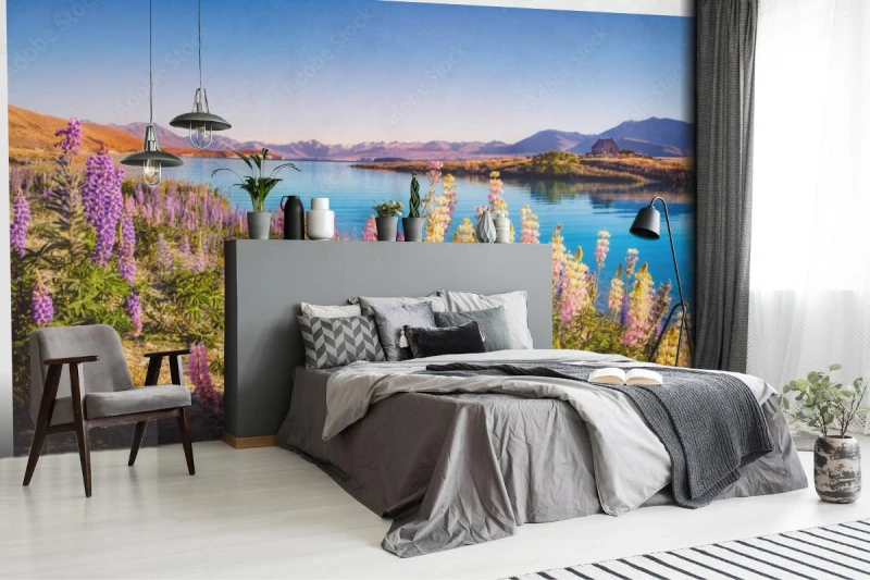 fototapeta krajobrazowy widok na jezioro tekapo i kwiaty w