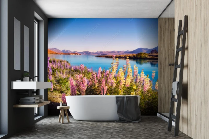 fototapeta krajobrazowy widok na jezioro tekapo i kwiaty w
