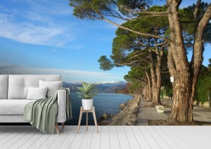 fototapeta zimowy brzeg jeziora z snieznymi gorami w tle